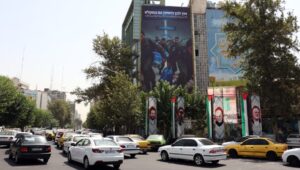 An anti-Israel poster with the Persian message "Smile for a while, for you will soon cry a lot" at Palestine Square in Tehran, Iran, on August 5, 2024. Iranian leader Ayatollah Khamenei vowed a "harsh punishment" against Israel in retaliation for the assassination of Hamas leader Ismail Haniyeh in Tehran on July 31, 2024. EPA-EFE/ABEDIN TAHERKENAREH
