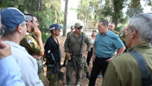 Defense Ministry Director General Maj. Gen. (res.) Eyal Zamir and security officers taking part in a drill that marked the start of the pilot, Aug. 12, 2024. Credit: Israeli Ministry of Defense.