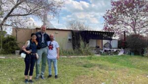 Avishay with us in front of his damaged house in Kfar Azza. April 2024. Private photo.