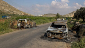 Illustration: Burnt cars in the village of al-Mughayyir after Jewish settlers entered the village and set fire to cars and houses following the murder of 14-year-old Benjamin Achimeir on April 13, 2024. Photo by Flash90.