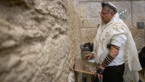 Israeli National Security Minister Itamar Ben-Gvir prays at the Kotel in Jerusalem's Old City, after his visit at the Temple Mount, July 18, 2024. Photo by Chaim Goldberg/Flash90.