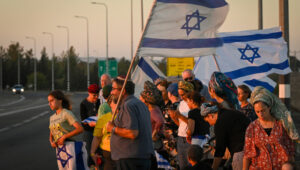 Israelis gather with national flags at 100 locations nationwide to strengthen the country's unity, Hispin, Golan Heights, on August 8, 2024. Photo by Michael Giladi/Flash90