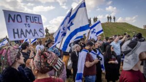 Israelis protest against aid trucks entering the Gaza Strip at the Kerem Shalom border crossing, Jan. 29, 2024. Photo by Chaim Goldberg/Flash90.