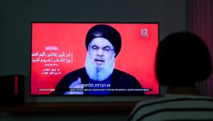 A woman watch the speech of Secretary-general of Hezbollah Hassan Nasrallah at her home in Mishmar David, September 19, 2024. Photo by Nati Shohat/Flash90