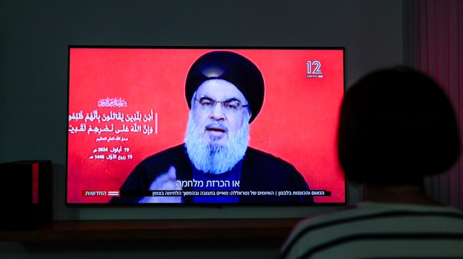 A woman watch the speech of Secretary-general of Hezbollah Hassan Nasrallah at her home in Mishmar David, September 19, 2024. Photo by Nati Shohat/Flash90
