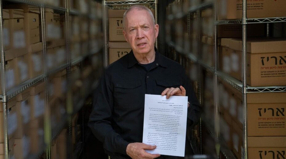 Israeli Defense Minister Yoav Gallant holds a document written by the former commander of Hamas's Khan Younis Brigade, Rafa'a Salameh, at an IDF intelligence base in central Israel, Sept. 11, 2024. Photo by Ariel Hermoni/Defense Ministry.