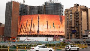 A billboard with Iranian missiles fired at Israel. Text: Honest promise, that is the name of Iran's retaliatory action against the Israeli occupation regime. Photo: Shutterstock.
