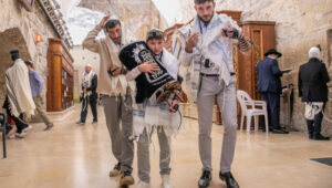 Taking responsibility for his actions. A boy celebrates his bar mitzvah at the Western Wall in the Old City of Jerusalem. Photo by Lee Aloni/FLASH90