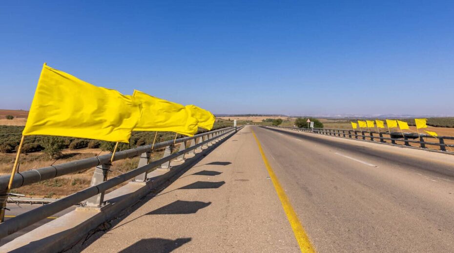 Yellow flags calling for the return of the Israeli hostages who have been held by Hamas terrorists in the Gaza Strip since Oct. 7, 2023, seen on Road 6 on Aug. 4, 2024. Photo by Yossi Aloni/Flash90.
