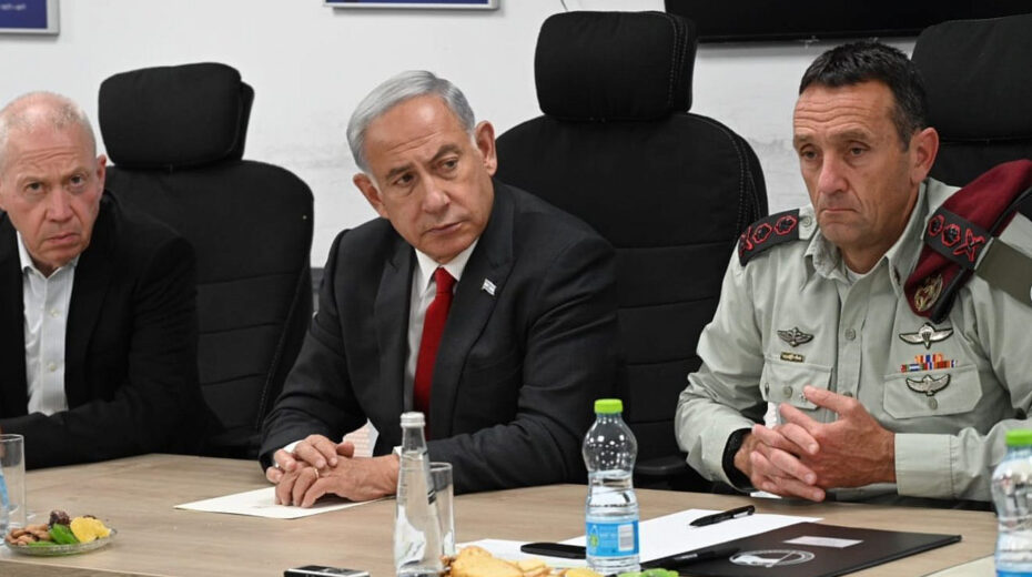 Israel's Prime Minister Benjamin Netanyahu holds a security assessment at Camp Dayan, north of Tel Aviv, after a barrage of rockets were fired from the Gaza Strip. Next to him are Israeli Defense Minister Yoav Gallant (left) and IDF Chief of Staff Herzi Halevy, May 2, 2023. Photo by Haim Zach/GPO.