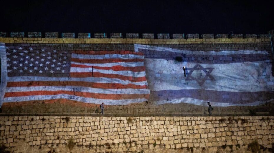 The American and Israeli flags are screened on the walls of Jerusalem's Old City to thank U.S. President Joe Biden for his support for Israel on Oct. 18, 2023. Photo by Yonatan Sindel/Flash90.
