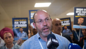Tzvika Mor with family members of Israelis killed in the current war during a press conference in the Knesset in Jerusalem, July 8, 2024. Photo: Yonatan Sindel/Flash90