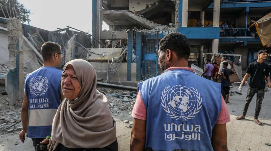 UNRWA officials at the site of an Israeli airstrike in the Nuseirat camp in the central Gaza Strip, July 15, 2024. Photo by Abed Rahim Khatib/Flash90.