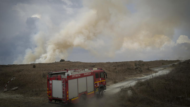 Firefighters combat wildfires following a 25-missile barrage on the northern town of Katzrin and central Golan Heights, Nov. 3, 2024. Photo by Michael Giladi/ Flash90.