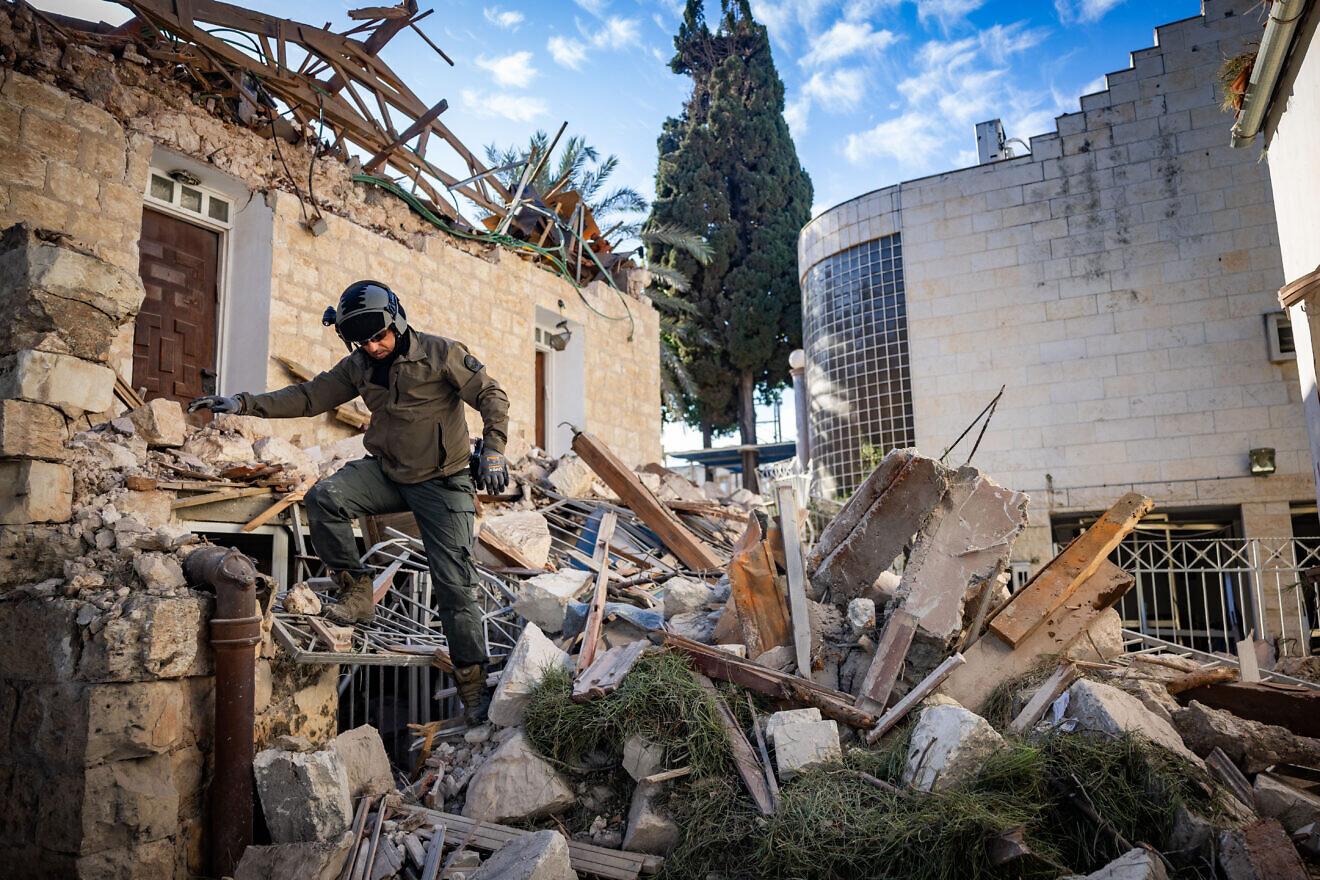 The aftermath of a direct hit by a Hezbollah missile in the northern Israeli city of Haifa, Nov. 17, 2024. Photo by Yonatan Sindel/Flash90.