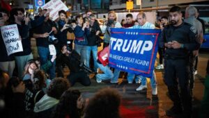 Israeli supporters of US President-elect Donald Trump confront left-wing activists calling for and end to the war in Gaza and Lebanon, outside the US Embassy in Tel Aviv, November 20, 2024. Photo by Erik Marmor/Flash90