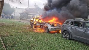 A car is seen in flames following a direct Hezbollah rocket hit in Petah Tikva in central Israel on Nov. 24, 2024. Credit: MDA.