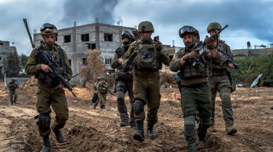 Brig. Gen. Itzik Cohen (center), commander of the IDF's 162nd Division, walks with other officers in Jabalia, the northern Gaza Strip, December 2023. Credit: IDF.