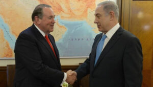 Then-Republican presidential candidate Mike Huckabee meets with Prime Minister Benjamin Netanyahu in Jerusalem in 2016. Credit: Israeli Prime Minister's Office.