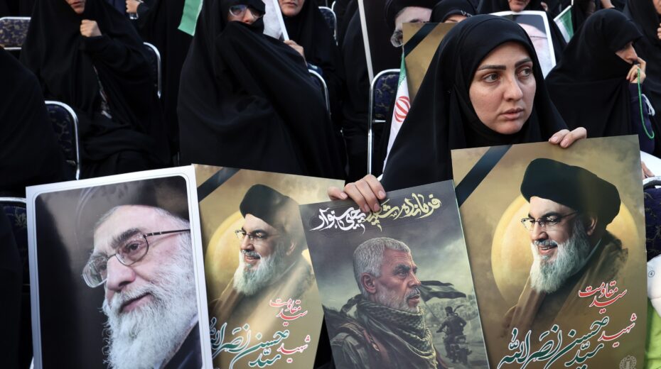 Pictures of Iranian Supreme Leader Ayatollah Ali Khamenei (L), slain Hezbollah leader Hassan Nasrallah (2-L; R) and slain Hamas leader Yahya Sinwar (2-R) during an anti-Israel rally at Palestine Square in Tehran, Iran, October 24, 2024. Photo: EPA-EFE/ABEDIN TAHERKENAREH