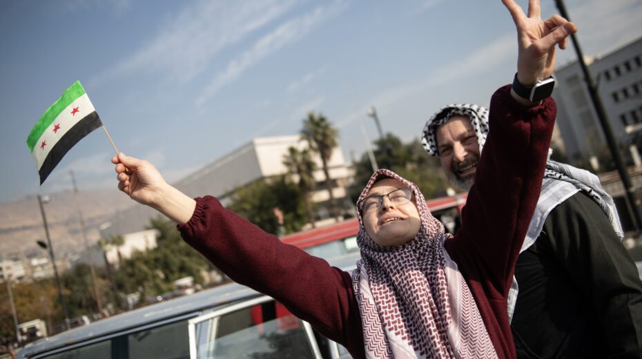 People celebrate in the street after Syrian rebels captured Damascus on 08 December 2024. Photo: EPA-EFE/HASAN BELAL