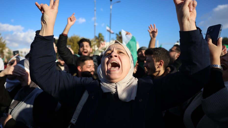 People celebrate the capture of Damascus by opposition forces after Friday prayers at Umayyad Square in Damascus, Syria, December 13, 2024. Photo: EPA-EFE/MOHAMMED AL RIFAI