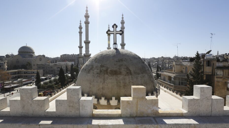 A church and a mosque in Aleppo, northern Syria. Archive photo: EPA/YOUSSEF BADAWI