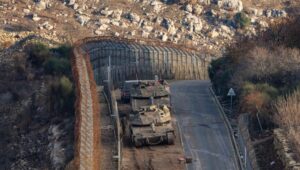 Israeli soldiers on the border fence on the Israeli border with Syria, northern Israel, December 9, 2024. Photo by Chaim Goldberg/Flash90
