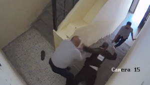 Screenshot of security camera footage showing Hamas officers abusing local prisoners in the Gaza Strip.