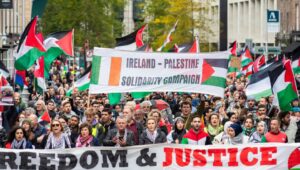 Dublin, Ireland - October 5, 2024: Thousands demonstrate with banners on Dublin's streets during a national march by the Ireland Palestine Solidarity Campaign (IPSC).