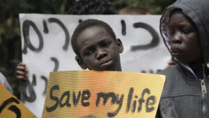 Refugees fleeing genocide in Sudan seek asylum in Israel, during a demonstration in Tel Aviv in 2012. Photo by Yossi Zamir/Flash90