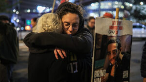 Families and supporters of the hostages in the Gaza Strip hear news of a release deal as they gather outside the Kirya military base in Tel Aviv, Jan. 15, 2025. Photo by Itai Ron/Flash90.