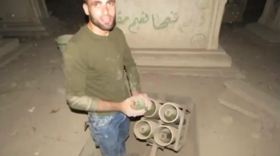 Screenshot of Hamas operatives setting up a rocket launcher in a cemetery in the Gaza Strip, on Jan. 14, 2025. Source: IDF Spokesperson's Office.
