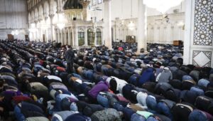People attend Friday prayers at the Umayyad Mosque on Friday after the overthrow of Syrian President Bashar al-Assad. Photo: Antonio Pedro Santos/EPA-EFE