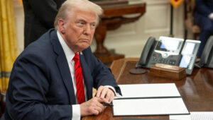 US President Donald Trump signs executive orders in the Oval Office, Feb. 10, 2025. Credit: Daniel Torok/White House.
