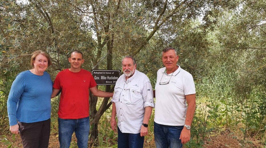Former Arkansas Gov. Mike Huckabee (third from left) and his wife Janet with My Tree in Israel founder Kobi Assaf and Israeli olive-grove farmer Gal Ashush, 2022. Credit: Courtesy/My Tree in Israel Archive Photo.