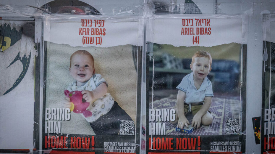 Posters of the Bibas boys, Kfir and Ariel, hang on a wall outside the Knesset in Jerusalem, Feb. 19, 2024. Photo by Chaim Goldberg/Flash90.