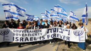 Israeli demonstrators demand sovereignty over Judea and Samaria, the biblical heartland that the world has renamed the "West Bank." Photo by Gershon Elinson/ Flash90