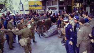 Israelis stand around a Scud missile fired by Iraq at Tel Aviv during the Gulf War, January 1991. Photo by Moshe Shai/FLASH90