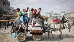 Palestinians displaced by Israel's war against Hamas flee from place to place among the ruins of Gaza. Photo by Abed Rahim Khatib/Flash90