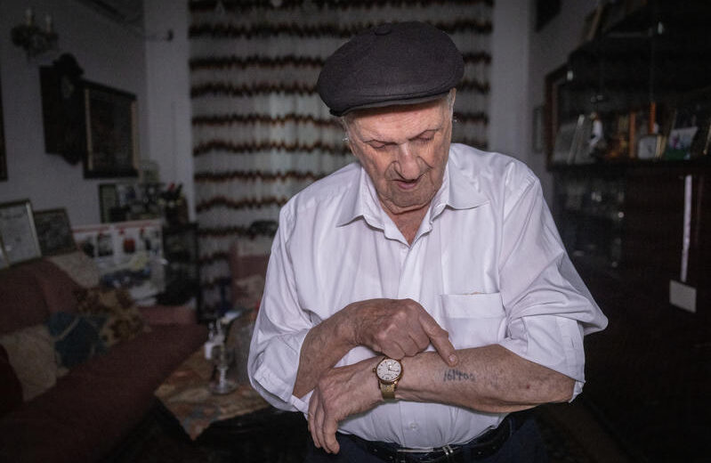 Portrait of Dov Landau, a 97-year-old Holocaust survivor, in his home in Tel Aviv, October 14, 2024. Photo by Chaim Goldberg/Flash90
