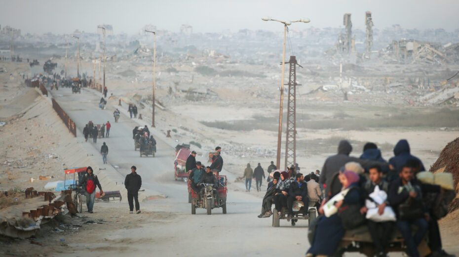 Palestinians travelling from south to north through the Gaza Valley on al-Rashid Street in the Nuseirat region on February 13, 2025. Photo by Ali Hassan/Flash90