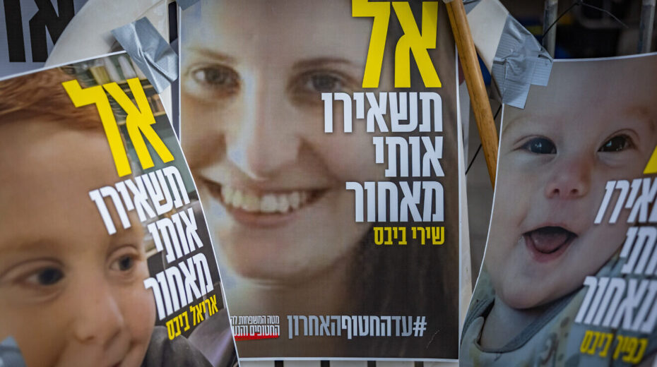 Pictures of Shiri Bibas and her children, Ariel and Kfir, who have been claimed dead by Hamas, hang outside the protest tent outside the Prime Minister's residence in Jerusalem, calling for the release of Israeli hostages still being held in the Gaza Strip, Feb. 19, 2025. Photo by Chaim Goldberg/Flash90.