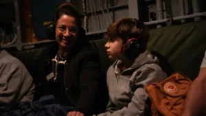 Yagil Yaakov with his mother, Renana, aboard an IDF helicopter after being released from Hamas captivity along with his older brother, Or, on November 27, 2023. Photo: IDF Spokesperson