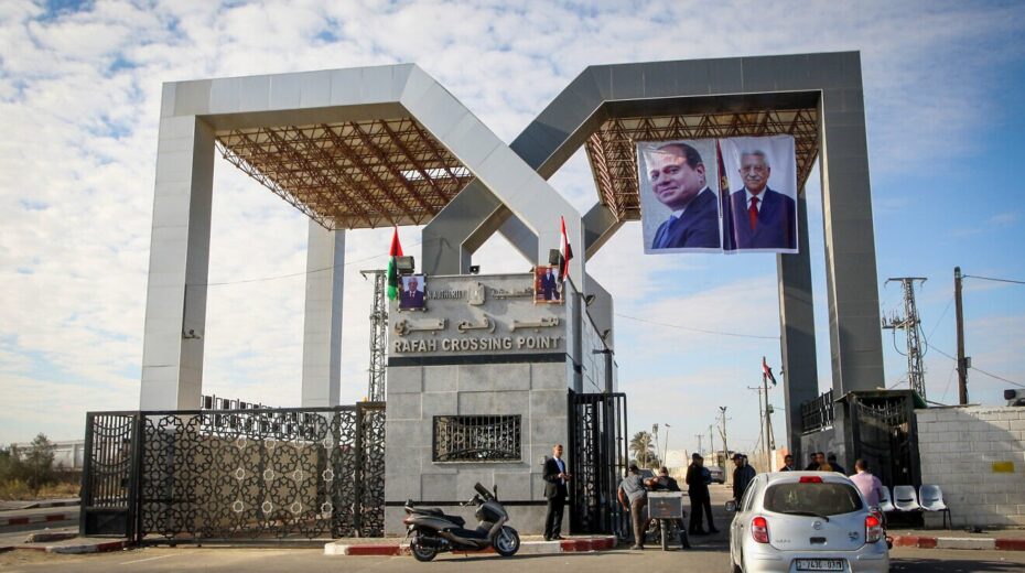 Portraits of Egyptian President Abdel Fattah al-Sisi and Palestinian leader Mahmoud Abbas hang at the Rafah border crossing with Egypt on Nov. 1, 2017. Credit: Abed Rahim Khatib/Flash90.