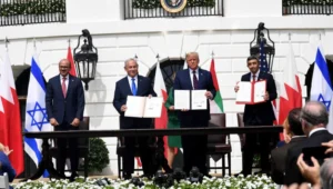 Israeli Prime Minister Benjamin Netanyahu, U.S. President Donald Trump, UAE Foreign Minister Abdullah bin Zayed Al Nahyan and Bahraini Foreign Minister Abdullatif bin Rashid Al Zayani hold up the Abraham Accords, during the signing ceremony at the White House, Sept. 15, 2020. Photo by Avi Ohayon/GPO.