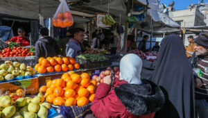 Palestinians shopping at a food market in Khan Yunis, southern Gaza, late last month. Photo by Abed Rahim Khatib/Flash90