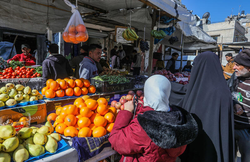 Palestinians shopping at a food market in Khan Yunis, southern Gaza, late last month. Photo by Abed Rahim Khatib/Flash90