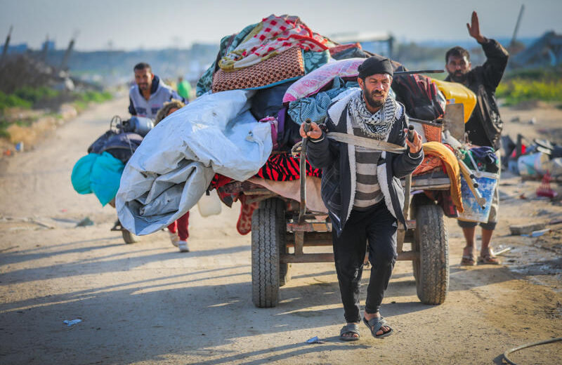 Palestinians seen with their belongings after fleeing from their homes in the Al-Maghraqa area in the central Gaza Strip, on Marsh 18, 2025. Photo by Ali Hassan/ Flash90