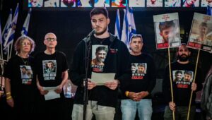 Former hostages, including Alexander "Sasha" Troufanov, hold a press conference at Hostage Square in Tel Aviv on March 18, 2025. Photo by Avshalom Sassoni/Flash90.
